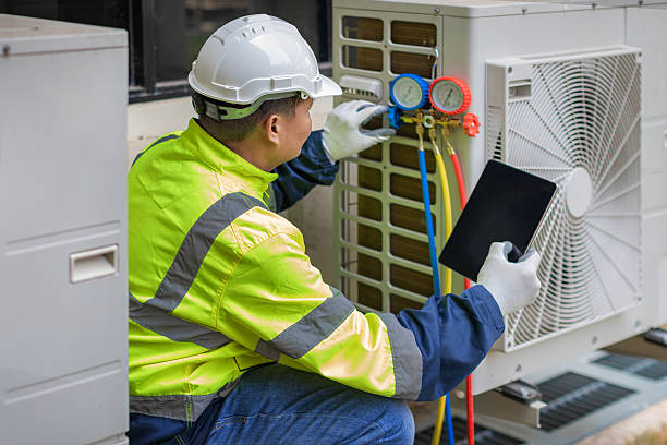 Professional Hvac technician working in Houston, DE